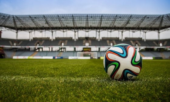 soccer ball on grass field during daytime