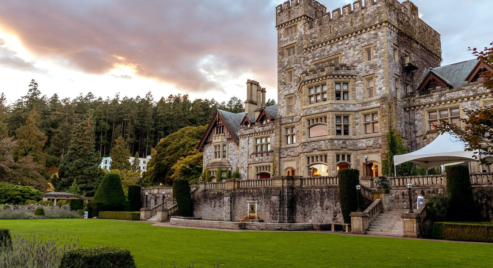 stone castle with green grass front yard